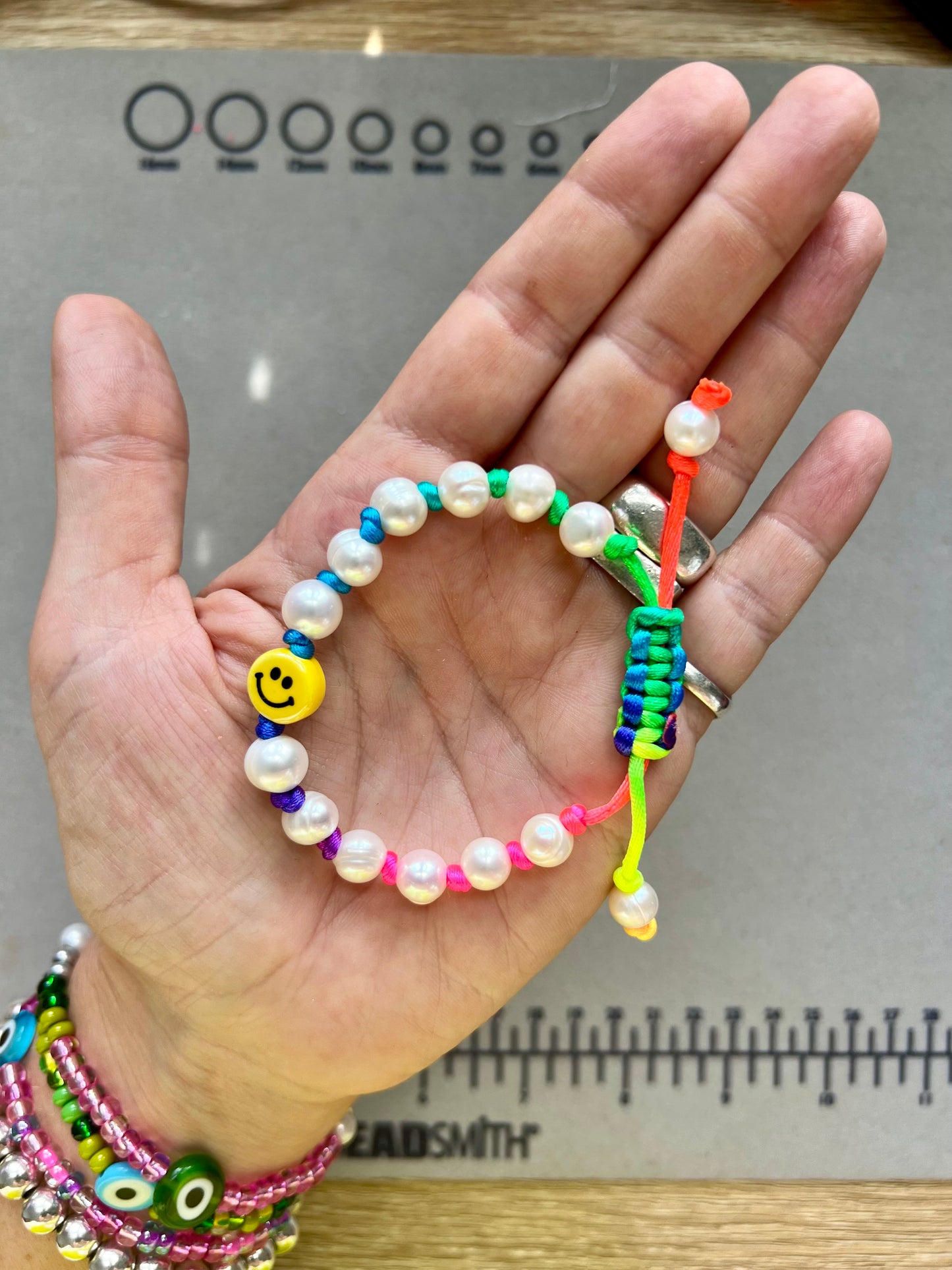 Hand Knotted Neon Smiley Pearl Bracelet ππ€