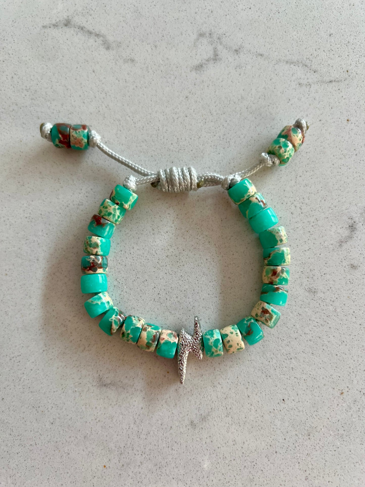 Silver Bolt & Teal Gemstone Bracelet